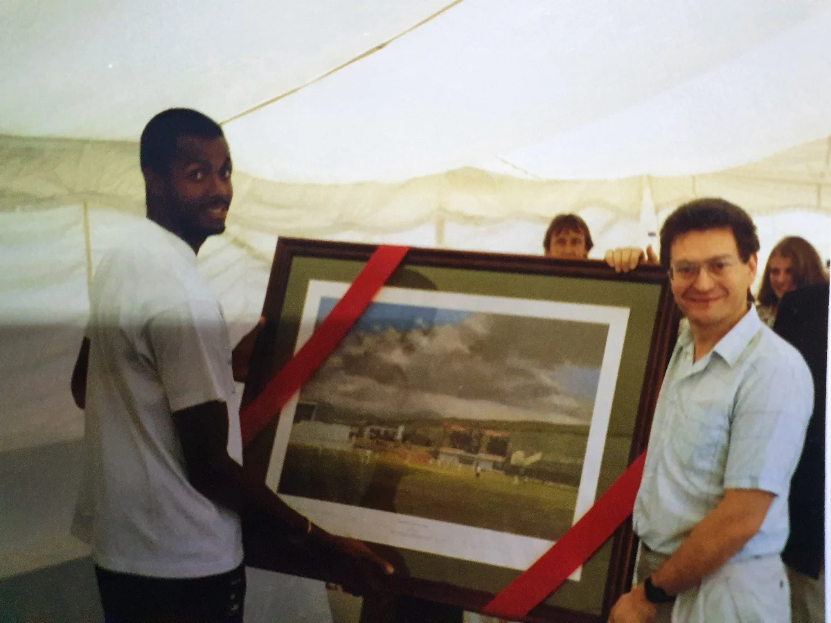 Courtney Walsh presents Jack Russell print to Philip.webp